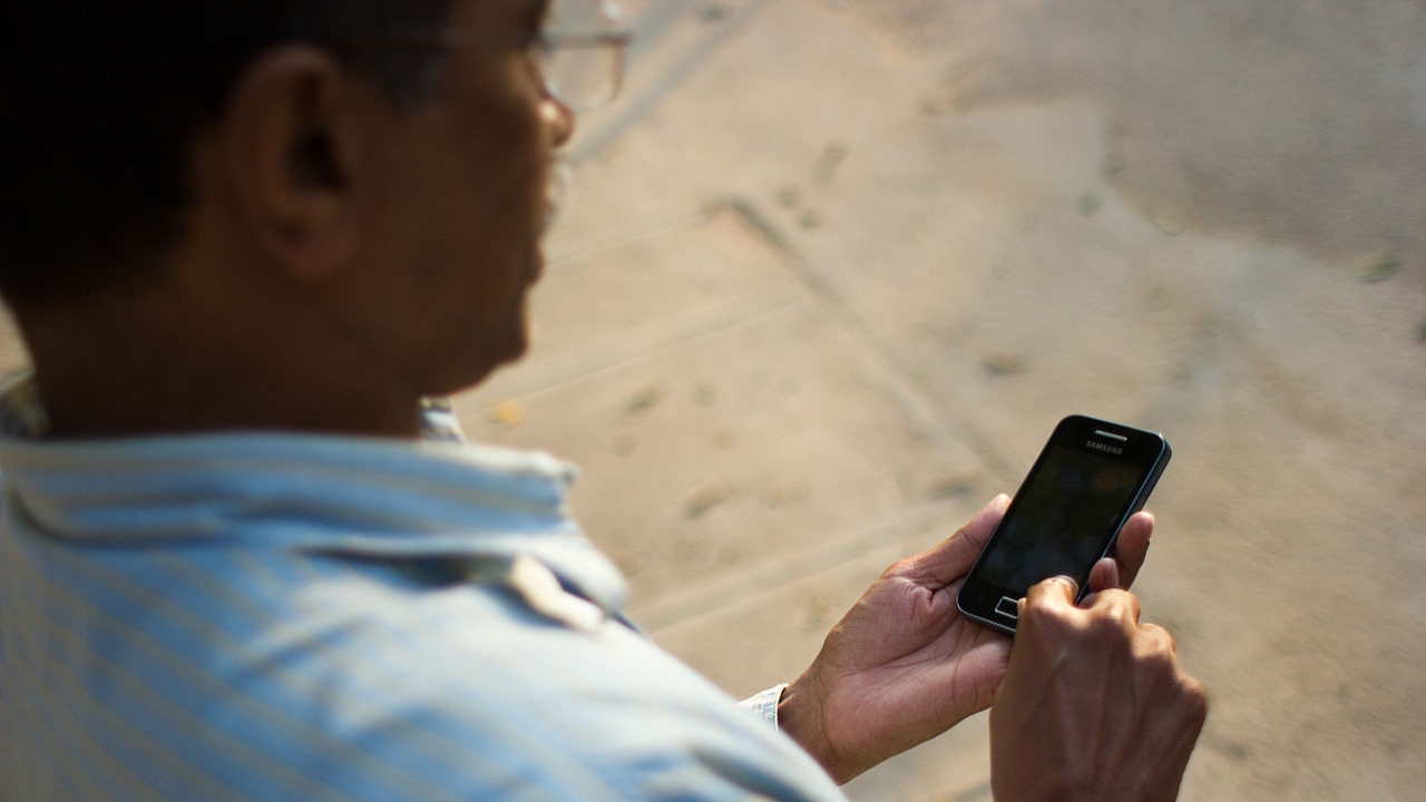 Bangalore Wikipedian on phone