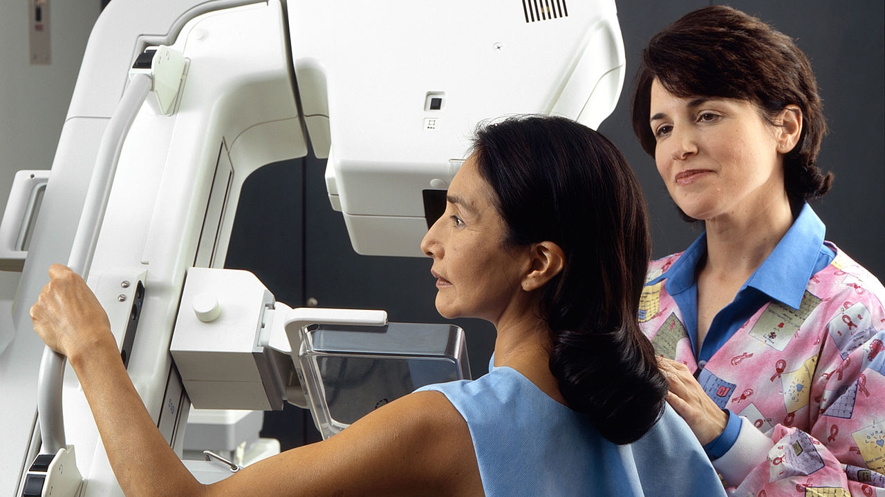 Woman receives mammogram